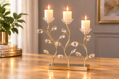 Gold crystal candle holder with lit candles