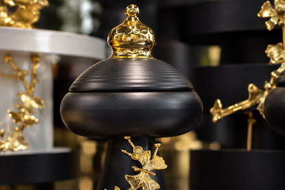 Gold finial and ginkgo detail close-up