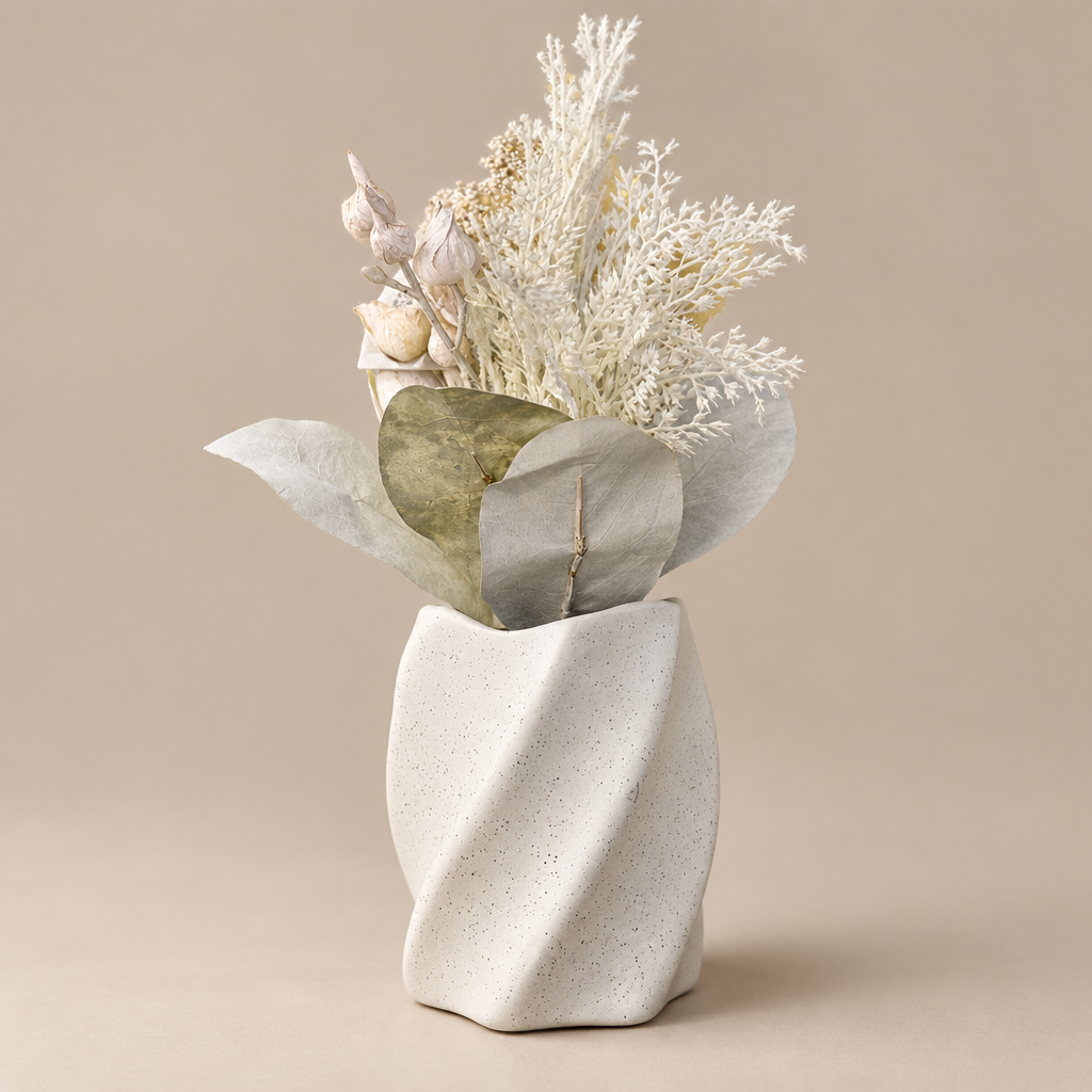 Minimalist white speckled twist vase, three-quarter angle
