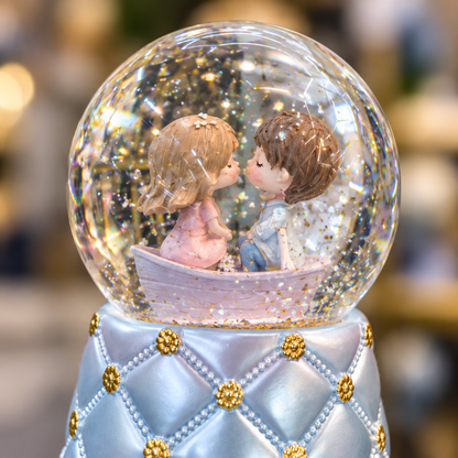 Close-up of couple figurine and glitter detail